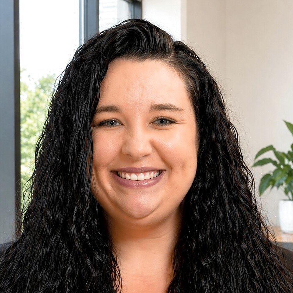Lauren Galvin smiling in a professional office headshot